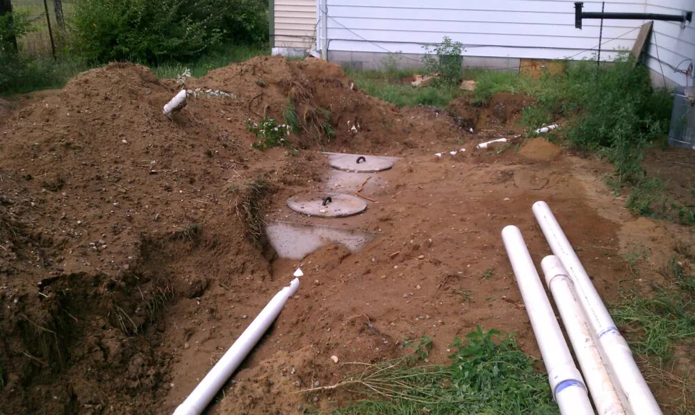 New drain lines running through a residential yard